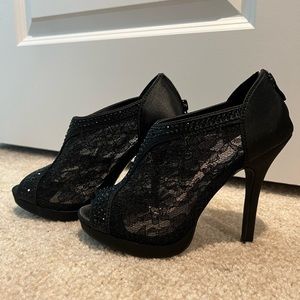 Brand new black lacey heels, size 6